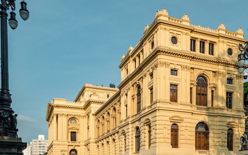 Virada Cultural 2026 — Beautiful historic architecture of a museum in São Paulo, Brazil under a blue sky.