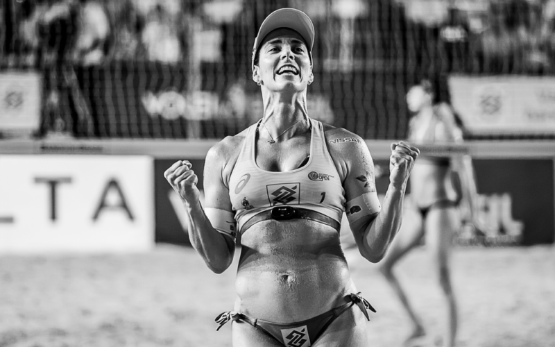 Liga das Nações de Vôlei — Joyful athlete celebrating a win at a beach volleyball game in João Pessoa, Brazil.